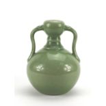 Chinese porcelain celadon glazed vase with twin handles, six figure character mark to the base, 22.