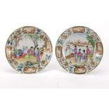 Pair of Chinese porcelain plates, both circular central panels finely hand painted with figures,