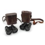 Two pairs of Military interest binoculars comprising W Gregory & Co and Heath & Co. examples the