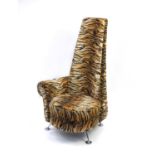 Stylish tiger print upholstered chair with chrome feet, 121cm high