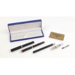 Three fountain pens together with a Waterman's Ideal 18k gold nib, the fountain pens including a
