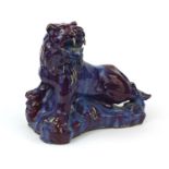 Large Chinese purple glazed lion, 31cm high