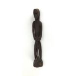 Tribal interest wooden carving of a tribesman, 59cm high