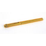 Cartier gold plated ballpoint pen with engine turned decoration, numbered 2298301