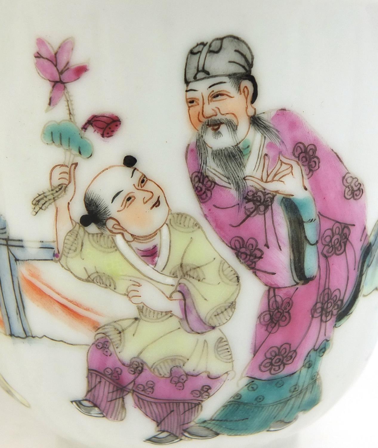 Pair of Chinese porcelain tea cups, hand painted in the famille rose palette with court figures - Image 2 of 11