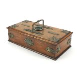 Edwardian oak smokers travelling box with brass mounts, carrying handle and two compartments, 13cm