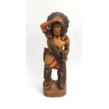 Floor standing wooden carving of an Indian Warrior, 95cm high