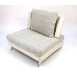 Vintage lounger with cream flecked upholstery, 75cm high x 95cm wide x 95cm deep