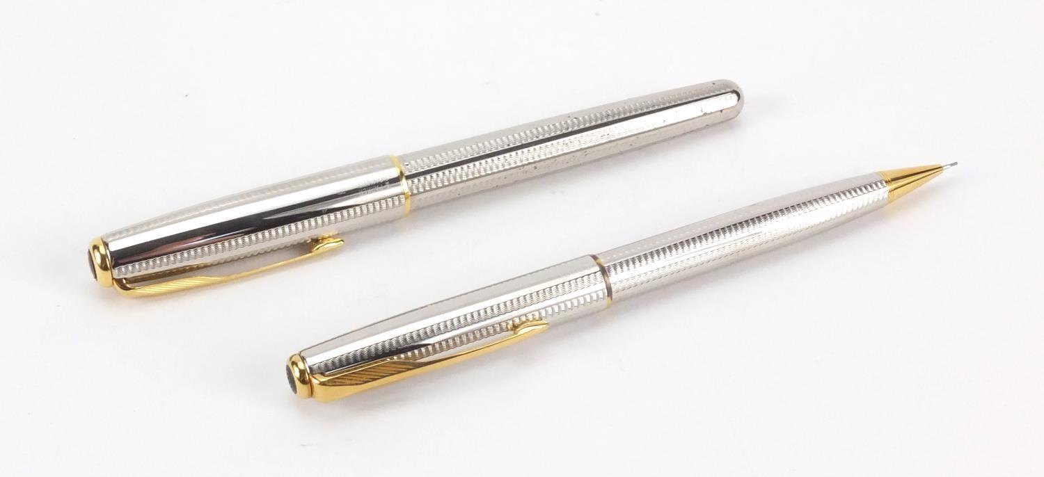 Parker Sonnet ballpoint pen and propelling pencil, both with engine turned decoration and with case