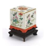 Chinese porcelain two piece square incense burner raised on a square hardwood base, finely hand