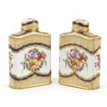 Pair of 19th century Sevres porcelain canisters hand painted and gilded with birds and flowers,