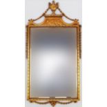 Rectangular gilt framed bevel edged mirror, decorated with urns, figures and swags, 114cm x 62.5cm