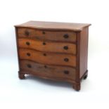 Georgian mahogany serpentine fronted chest fitted with four graduated drawers with canted corners on