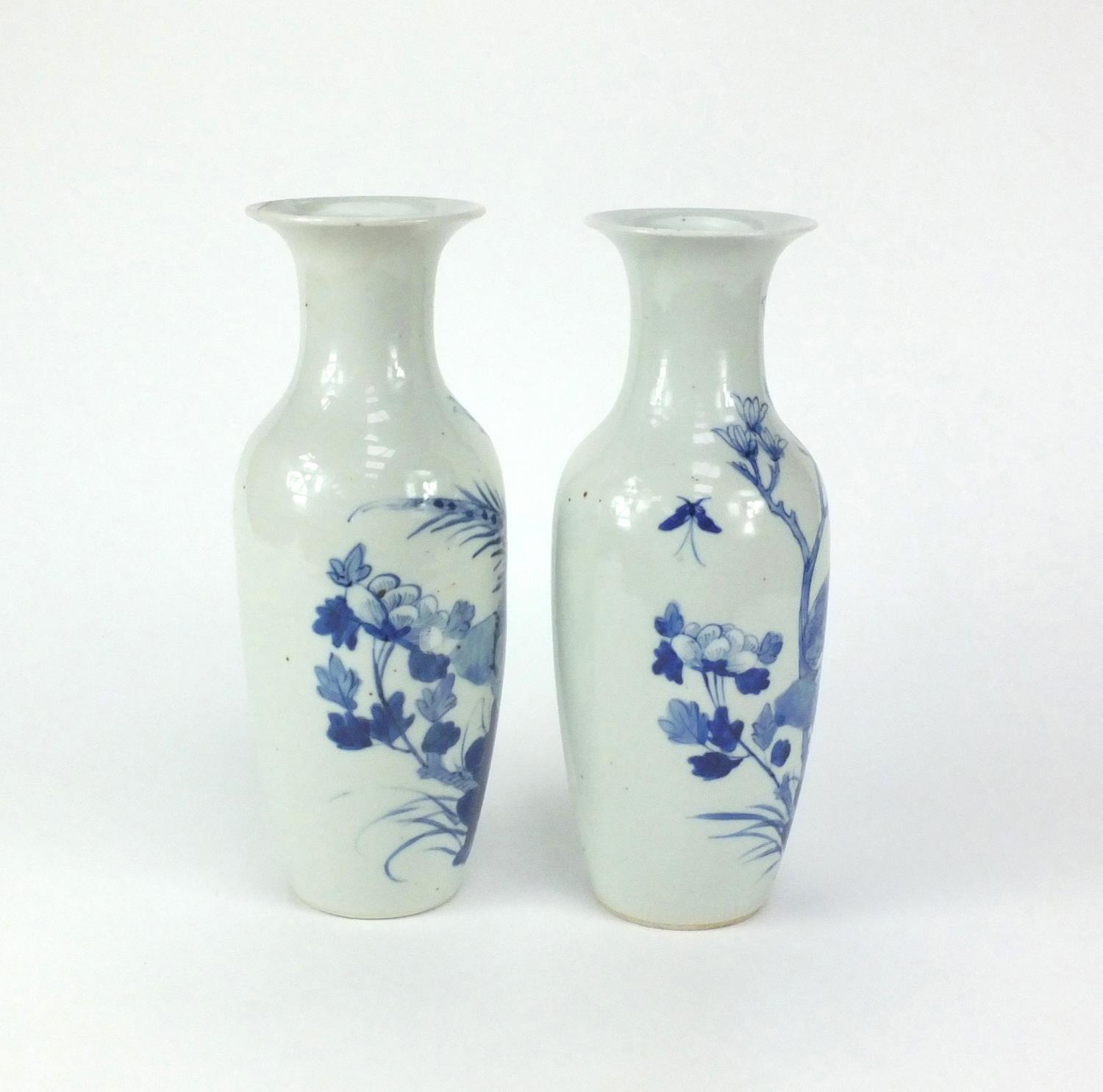 Pair of Chinese blue and white porcelain baluster shaped vases, both hand painted with birds and - Image 2 of 4