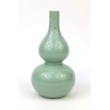 Chinese porcelain celadon glazed vase, of double gourd form, six figure Qianlong character marks