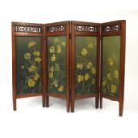 Aesthetic walnut four fold screen with foliate fret work panels above four rectangular panels,