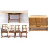 Heals Art Deco limed oak draw leaf dining table with four chairs and a sideboard, fitted with