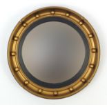 Circular gilt framed convex mirror, 41cm in diameter : For further condition reports please visit