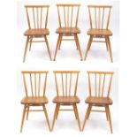 Set of six Ercol light elm stick back dining chairs, each with labels, each 80cm high : For