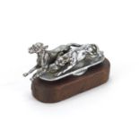 Vintage chrome car mascot of two dogs, on wooden plinth, 11cm wide : For further condition reports