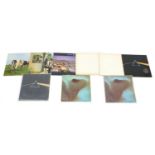 Pink Floyd vinyl LP records indulging Meddle, Dark Side of the Moon, The Wall and Atom Heart