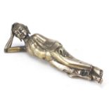 Silvered bronze reclining Buddha, 23cm wide : For further condition reports please visit www.