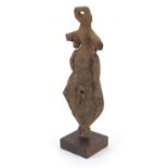 Ethnic stone carving of a goddess raised on a square wooden base, overall 62cm high : For further