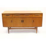 1970's G-plan teak sideboard with three drawers above four cupboard doors, 85cm H x 152cm W x 46cm D