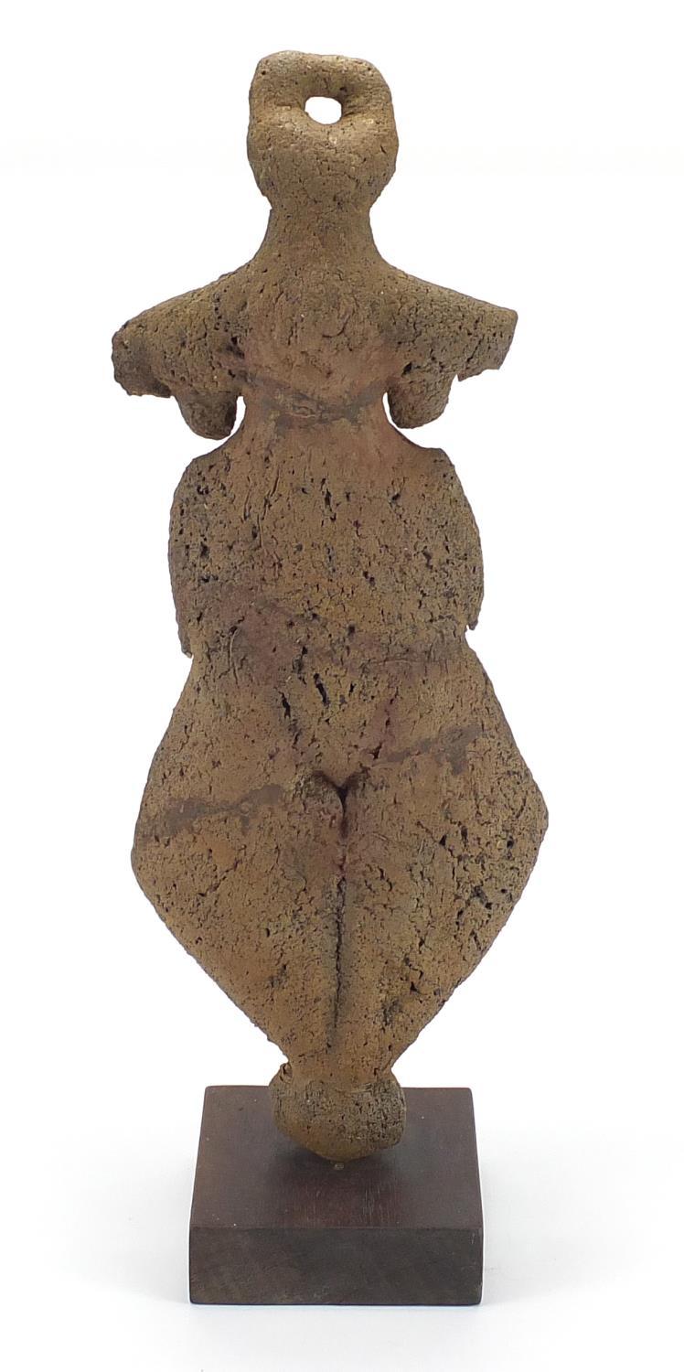 Ethnic stone carving of a goddess raised on a square wooden base, overall 62cm high : For further - Image 7 of 9