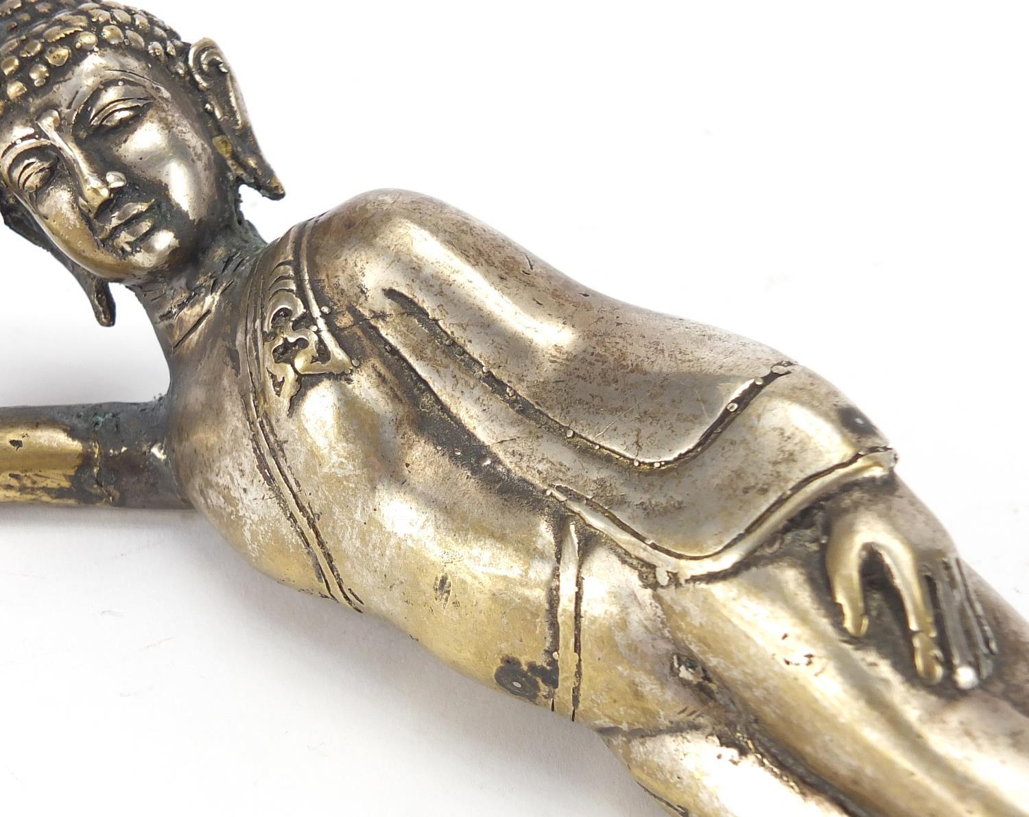 Silvered bronze reclining Buddha, 23cm wide : For further condition reports please visit www. - Image 3 of 7