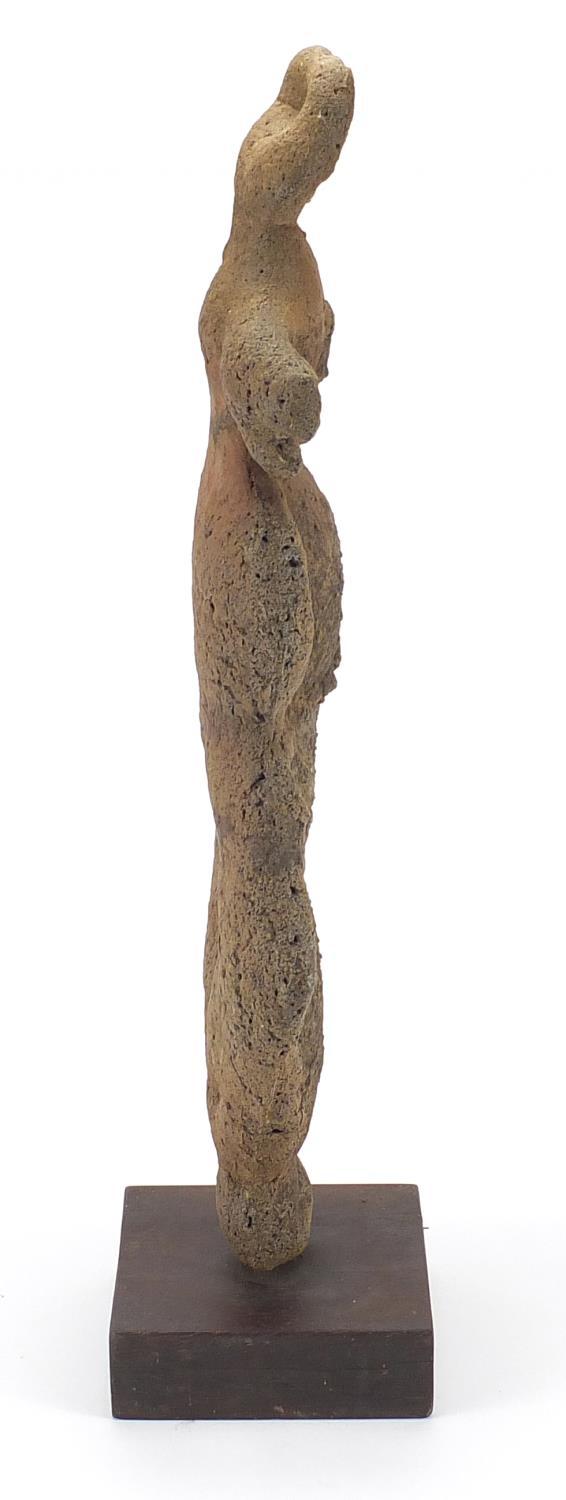 Ethnic stone carving of a goddess raised on a square wooden base, overall 62cm high : For further - Image 8 of 9