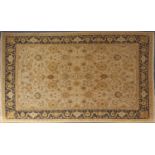 Rectangular Tabriz design carpet onto a beige ground, 350cm x 260cm : For further condition