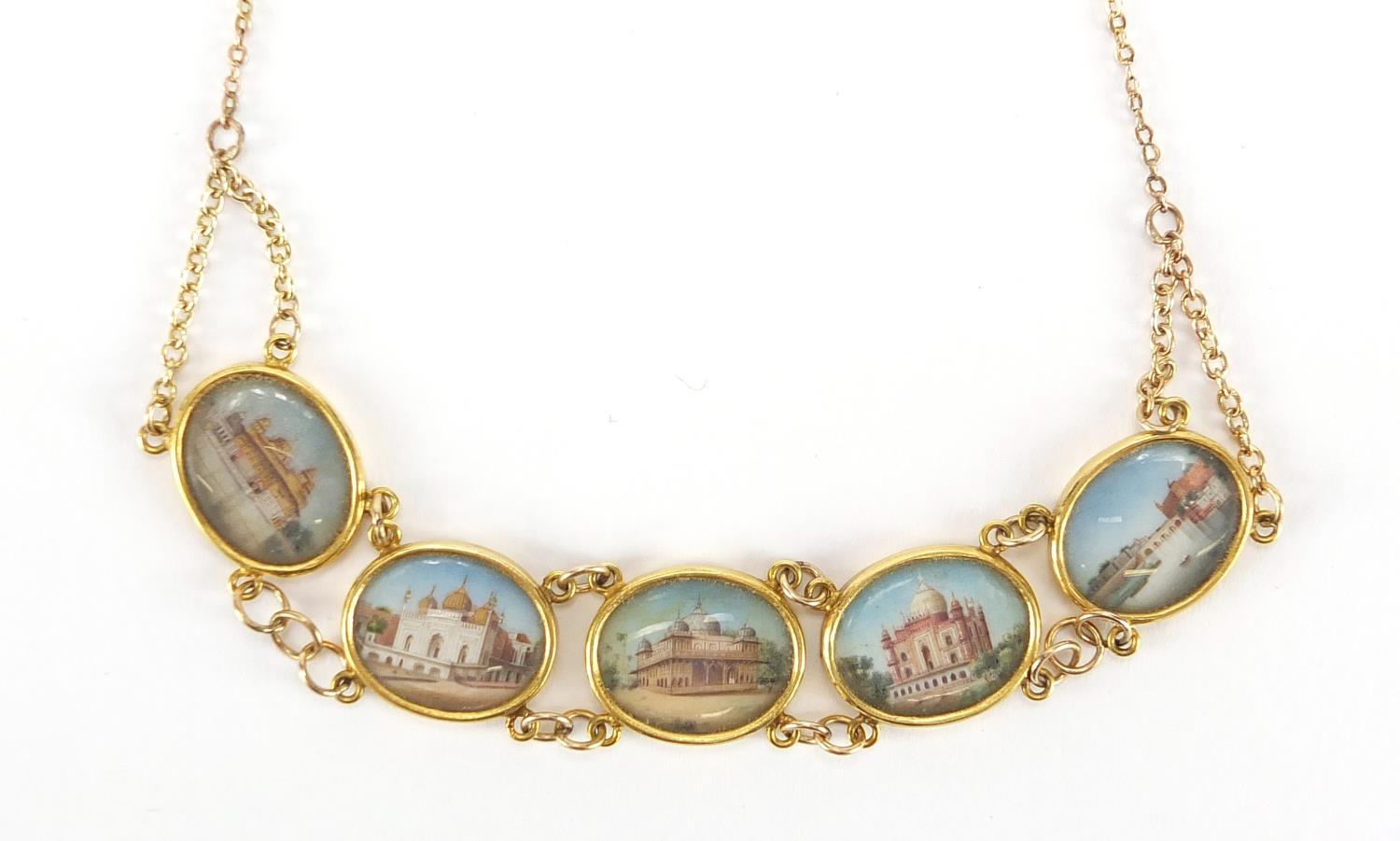 Five Indian watercolour miniatures onto ivory panels, housed in unmarked gold mounts and necklace,