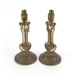 Pair of Playmit brass gimbal lamps, impressed AP9009 to the bases, each 31cm high : For further