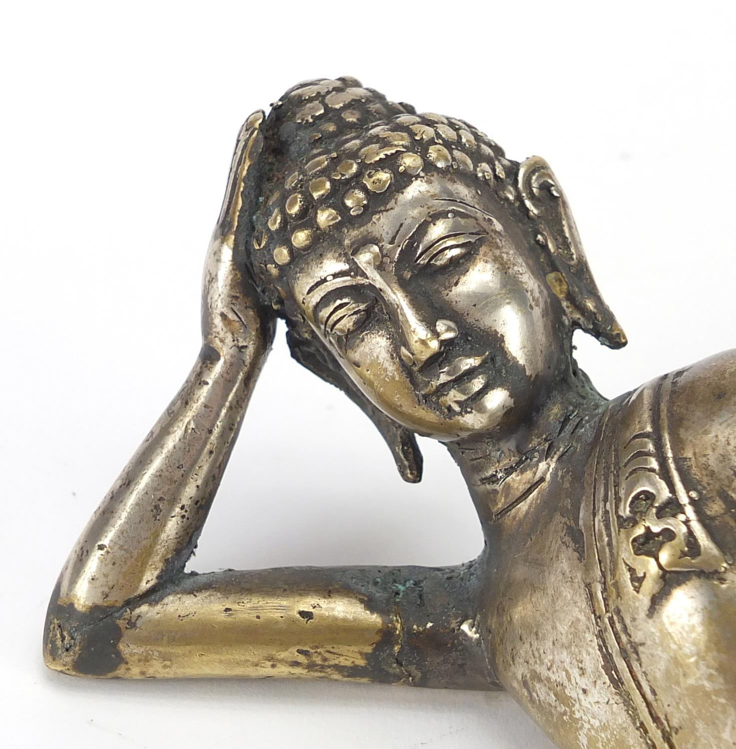 Silvered bronze reclining Buddha, 23cm wide : For further condition reports please visit www. - Image 2 of 7