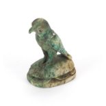 Egyptian hard stone hieroglyphic seal carved as a bird upon a scarab beetle, 8.5cm high : For
