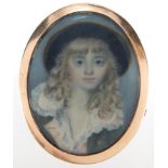 19th century oval hand painted portrait miniature onto ivory of a young gentleman wearing a hat,