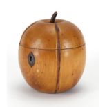 Fruitwood tea caddy of apple form with metal escutcheon and remnants of lining to the interior, 13cm