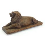 Antique continental wood carving of a recumbent lion, 46cm wide : For Further Condition Reports