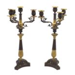 Pair of 19th century French Empire style Ormolu and bronze three branch candelabra, each 47.5cm high