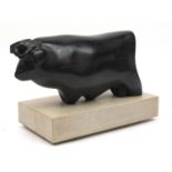 Caroline Byng Lucas 1886-1967, Bull, large ebony sculpture on rectangular stone plinth, exhibited in