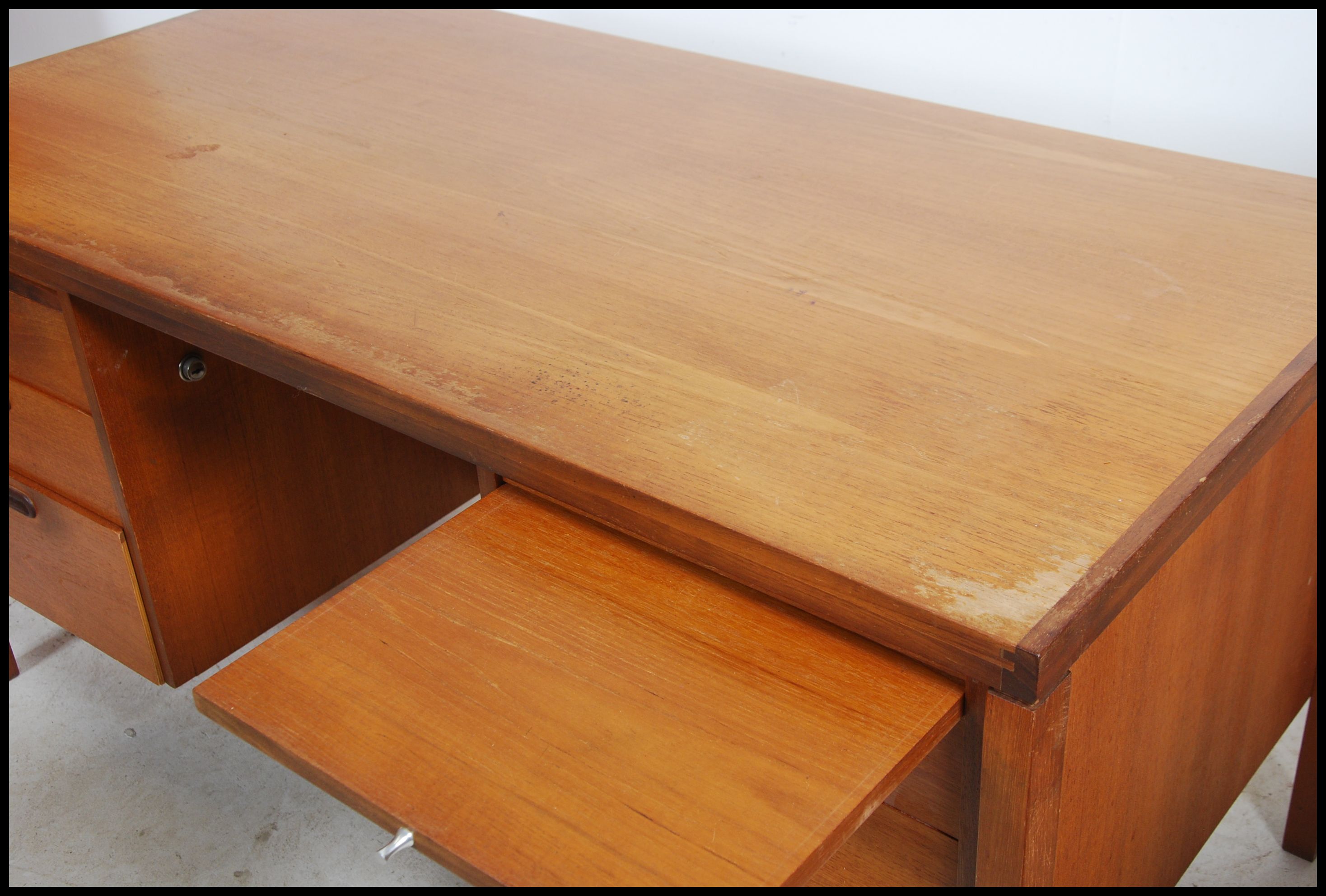 A 1970's good Danish inspired teak wood twin pedestal office desk being raised on squared legs - Image 3 of 6