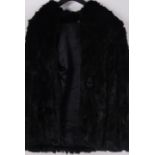 A vintage ladies 20th century hip length rabbit fur coat in black size 18.