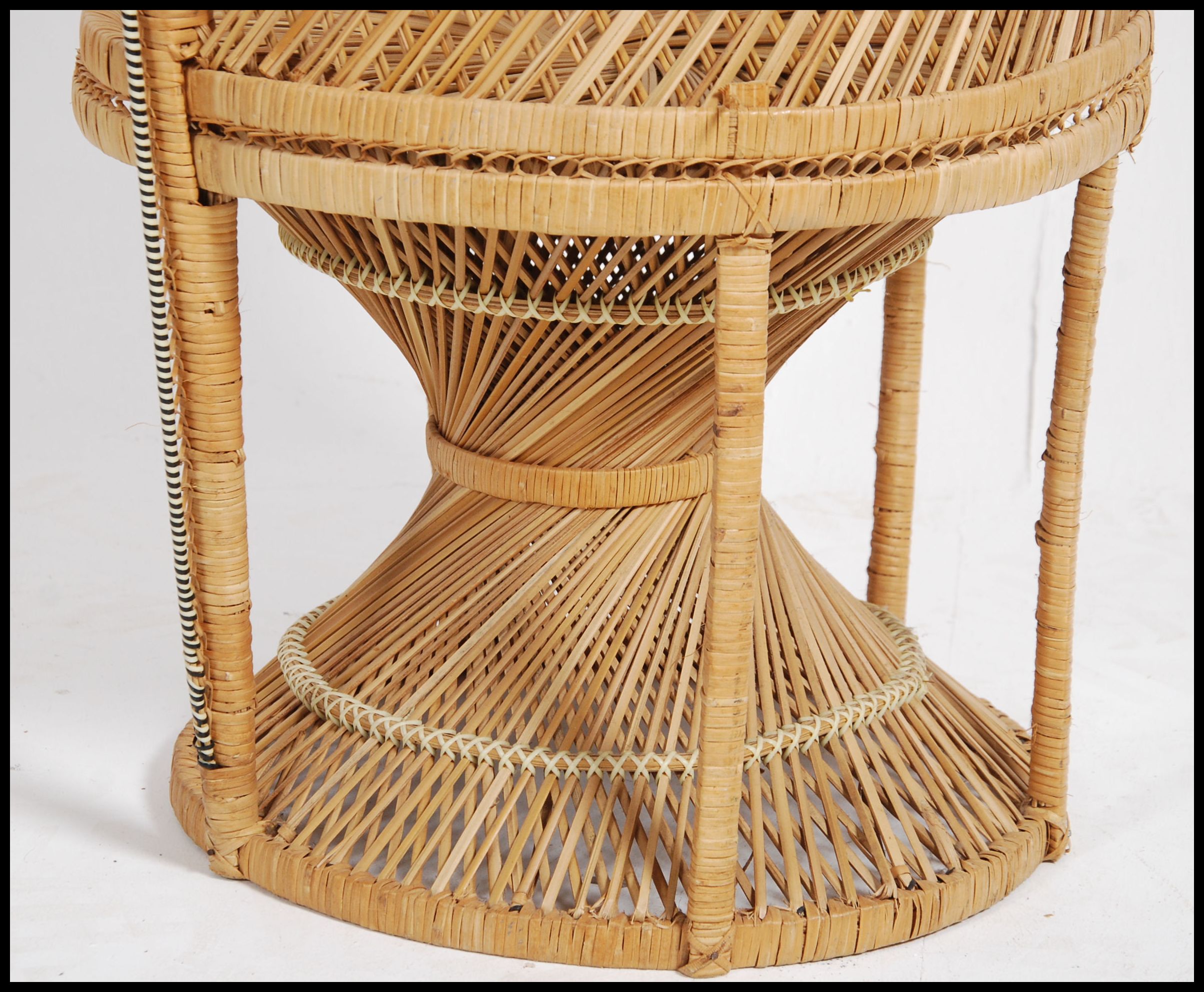 A vintage 20th century retro wicker peacock armchair with a large open back and woven seat. Measures - Image 5 of 5