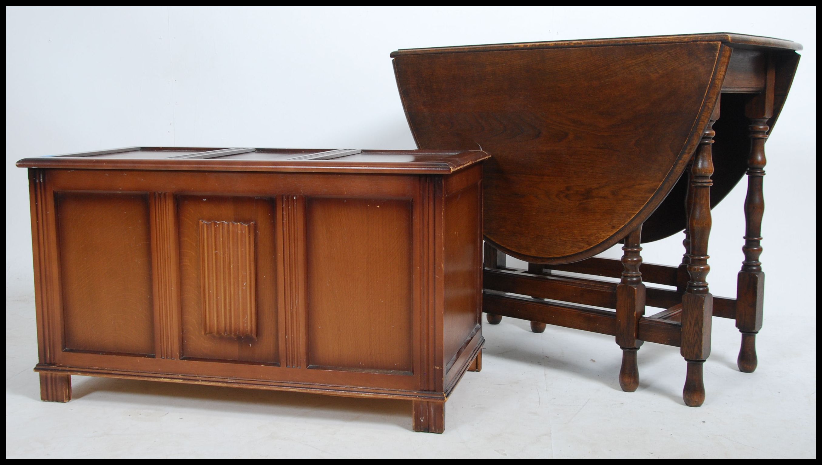 A collection of furniture to include a Jacobean revival mid century oak blanket box together with an