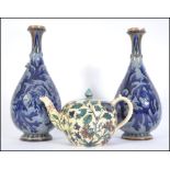 A 19th century Faience ceramic ware teapot decorat