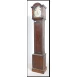 A 20th century oak cased granddaughter clock by Ke