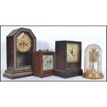 A collection of clocks to include a Victorian Junghans 8 day gingerbread clock, an anniversary clock