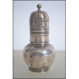 A Victorian silver hallmarked condiment - pepper pot. The pot hallmarked for  Pairpoint Bros -John &