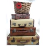 A vintage stack of suitcases to include a naval D - Mob case, a good leather case, a small leather